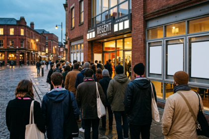 Festival-goers queuing outside an independent cinema at dusk, illustrating a guide to Sheffield DocFest