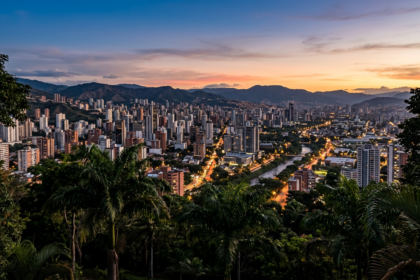 South American city skyline at dusk beyond palm trees, illustrating Brazil's 2026 presidential election